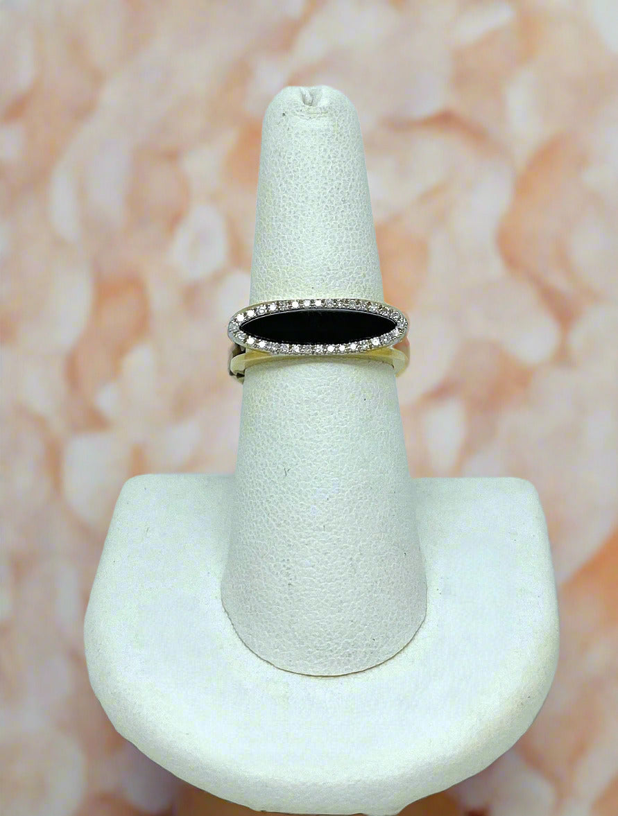 yellow gold and black onyx ring with diamond halo
