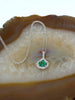 14kt Oval Emerald Necklace with Diamond Halo