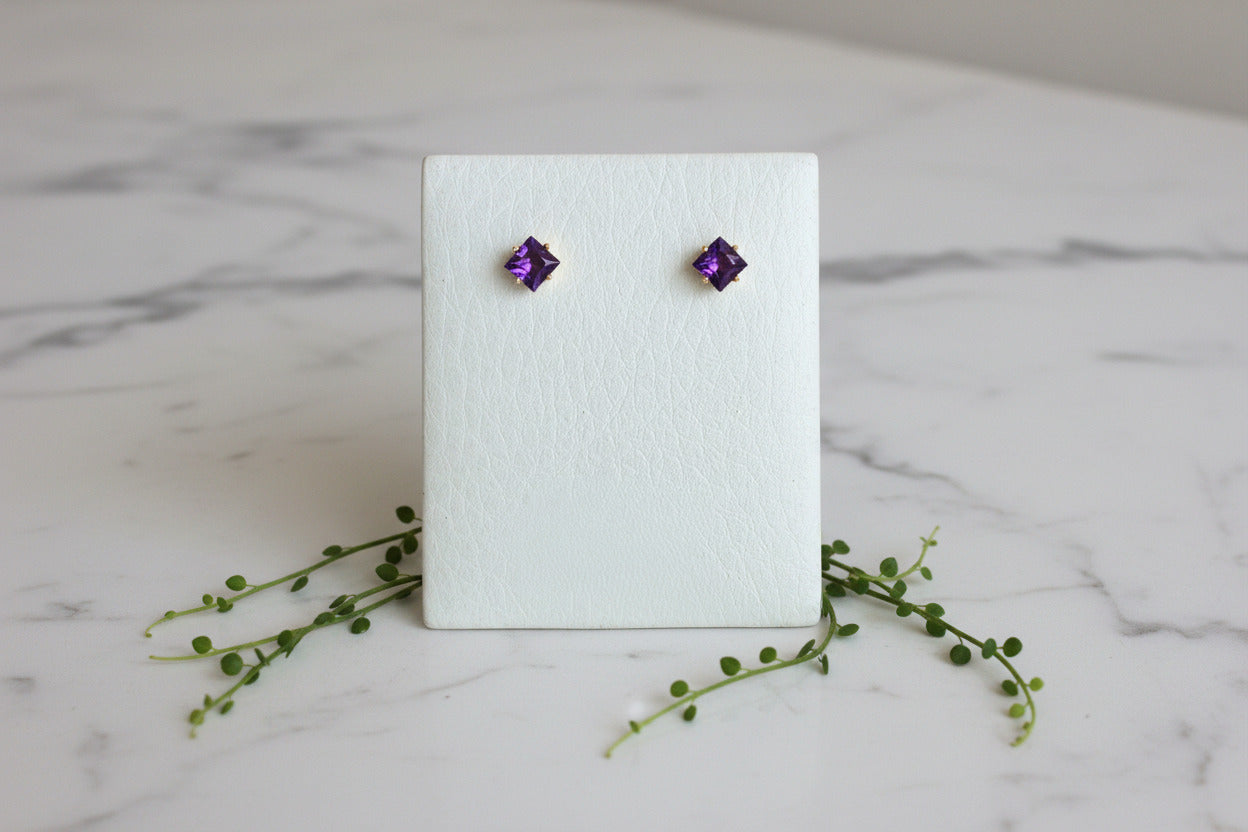 yellow gold stud earrings with princess cut amethysts