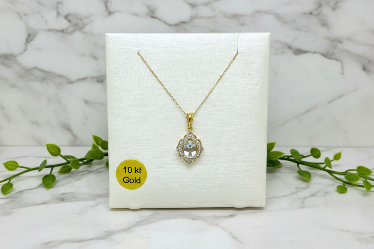 yellow gold necklace and pendant with oval aquamarine and diamonds