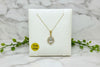 yellow gold necklace and pendant with oval aquamarine and diamonds