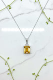 white gold pendant and chain with emerald cut citrine and diamond accents