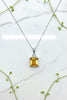 white gold pendant and chain with emerald cut citrine and diamond accents