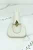 yellow gold ring with kite shaped moss agate center stone and 8 diamond accent stones