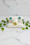 yellow gold stud earrings set with green lab-grown paraiba garnets