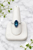 14 karat white gold ring with center london blue topaz, 2 baguette sapphires, and diamonds
